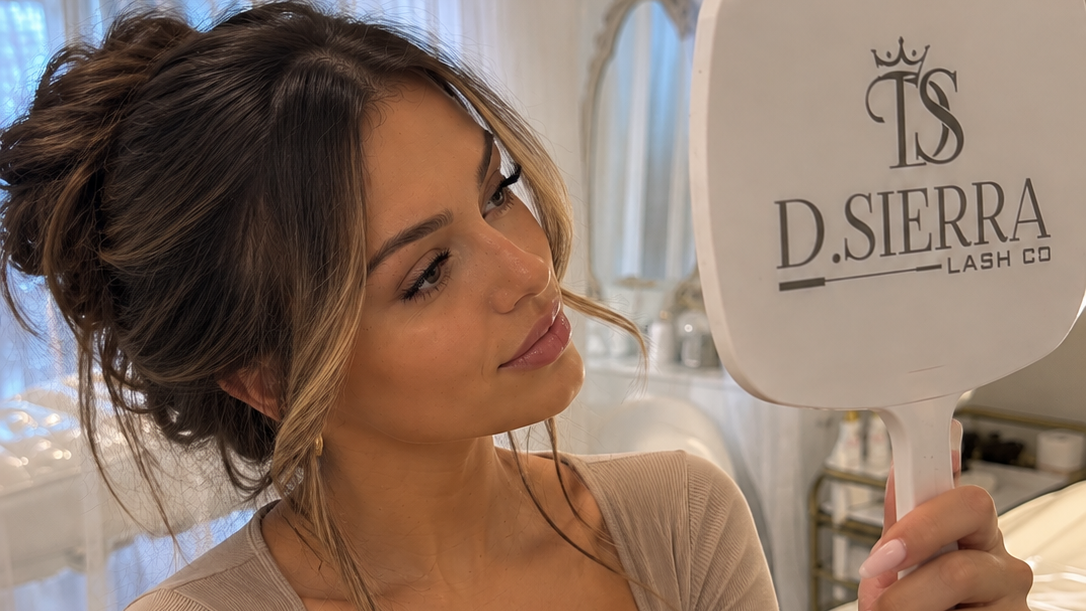 D.Sierra Hybrid lash client viewing her finished lashes